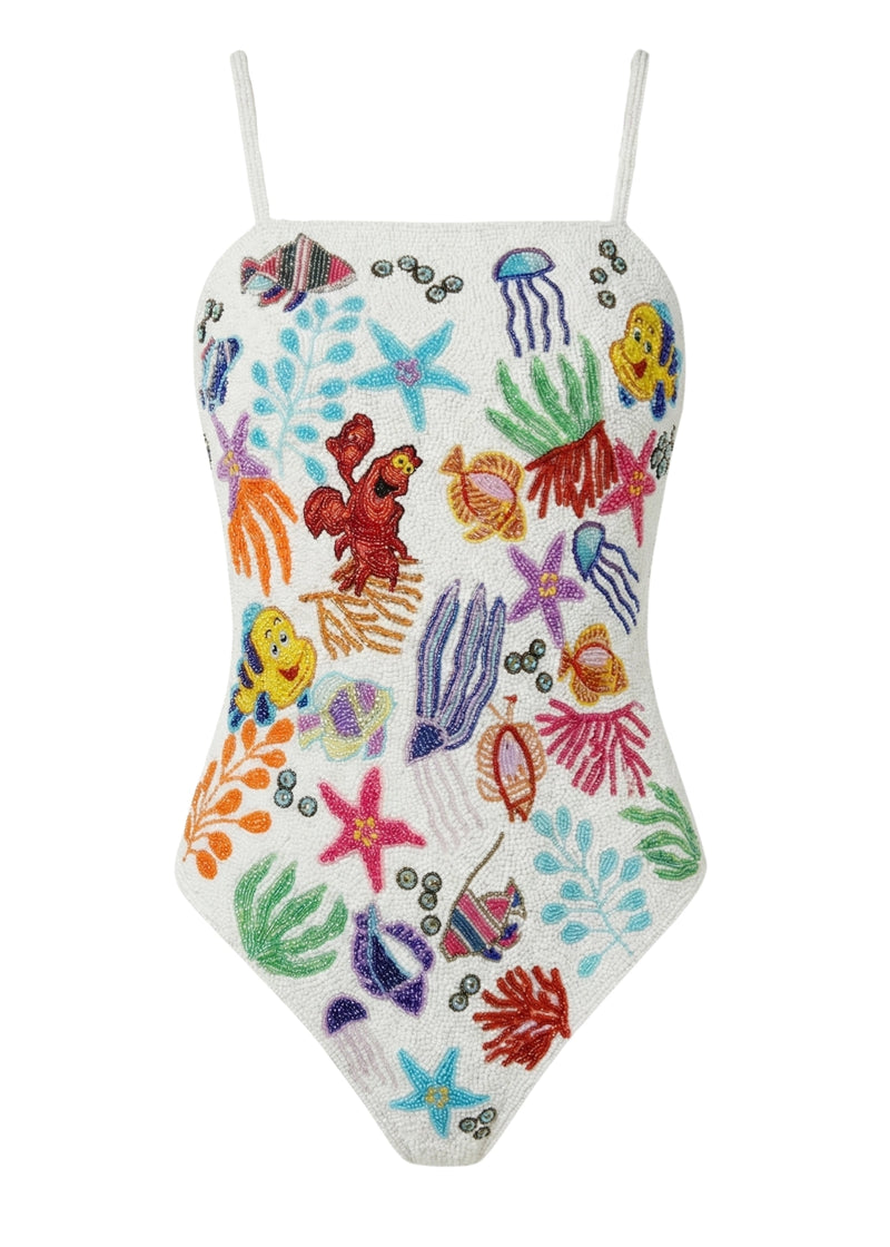 Colorful swimsuit with marine life design on a white background