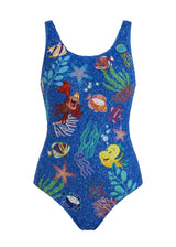 Blue swimsuit with colorful underwater-themed design on a white background