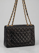 Vintage Chanel Classic Double Flap in black lambskin with gold hardware