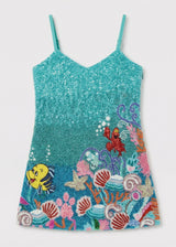 Sequined dress with underwater scene design on a white background