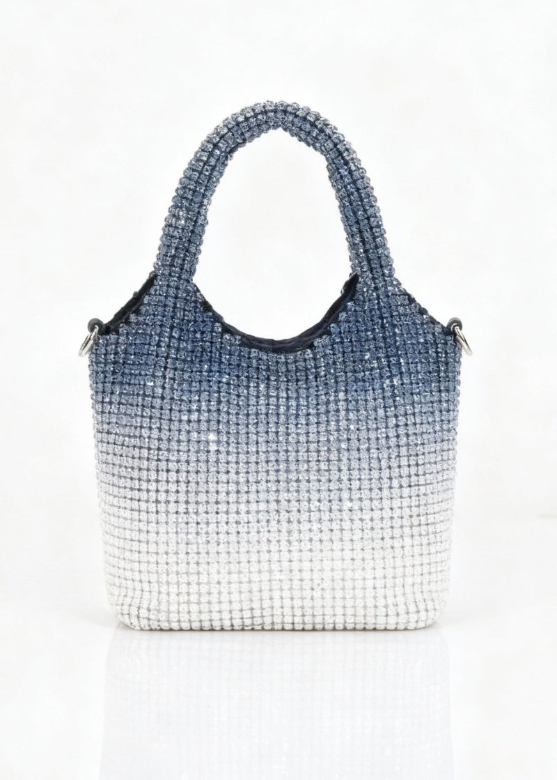 Gradient blue to white handbag on a white background