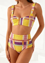 Multicolored checkered bikini set on a white background