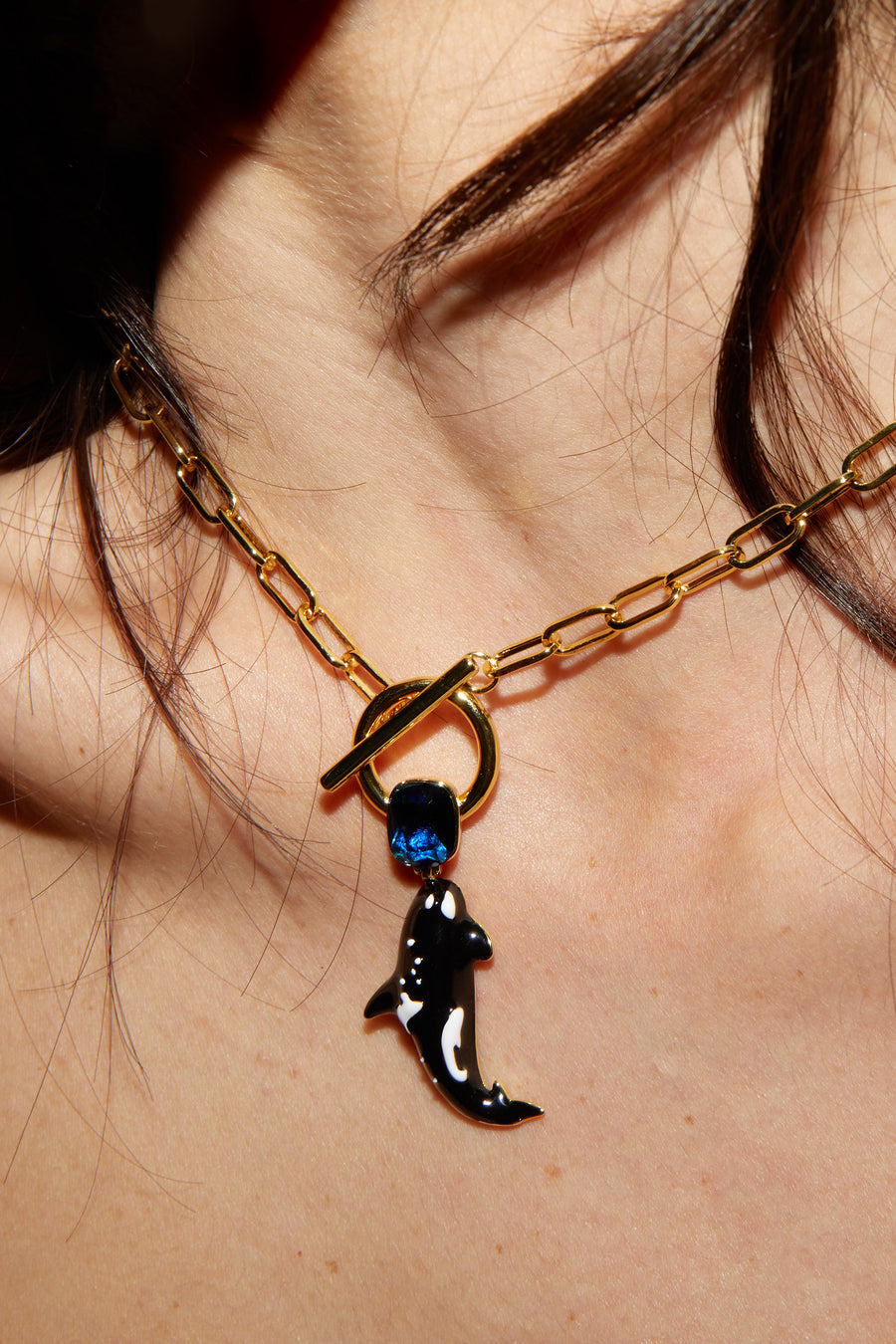 Women wearing The Orca Necklace