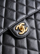 Vintage Chanel Classic Double Flap in black lambskin with gold hardware