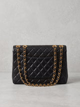 Vintage Chanel Classic Double Flap in black lambskin with gold hardware