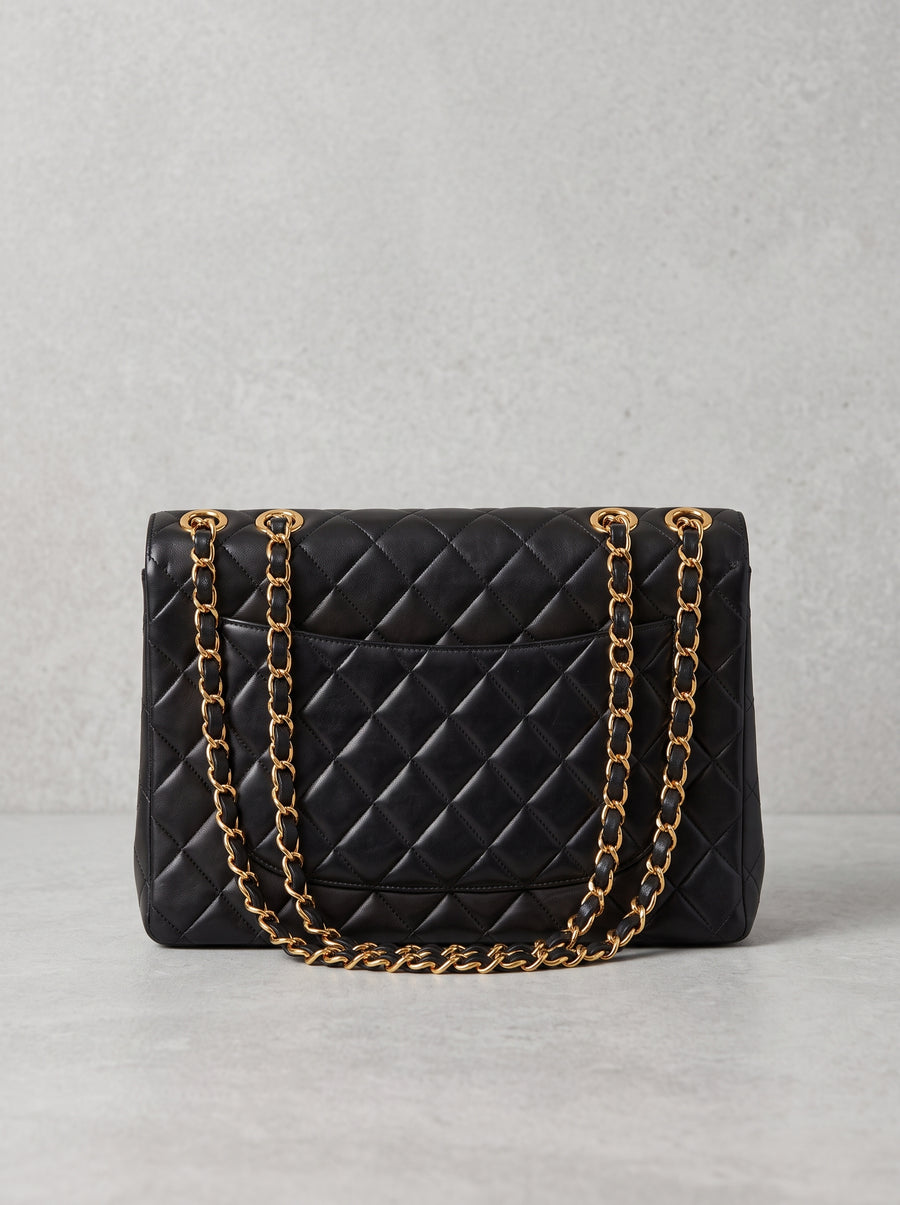 Vintage Chanel Classic Double Flap in black lambskin with gold hardware