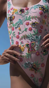 Girl wearing Alabama Floral Hand Embroidered One Piece Swimsuit in lite pink by Oceanus Swimwear